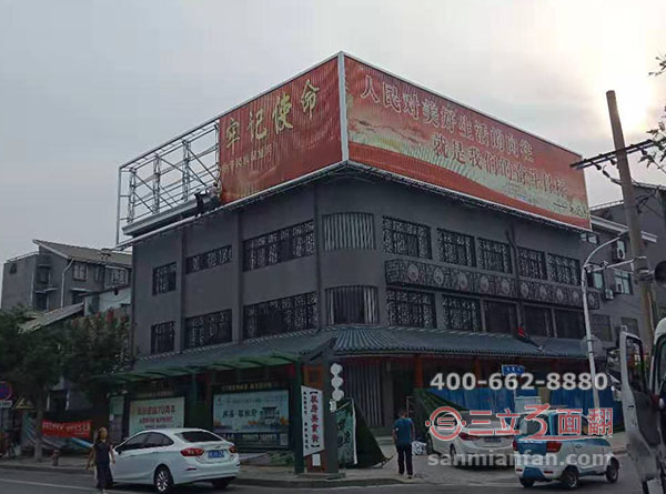 河南省許昌市樓頂鋼結(jié)構(gòu)三面翻廣告牌案例施工圖片